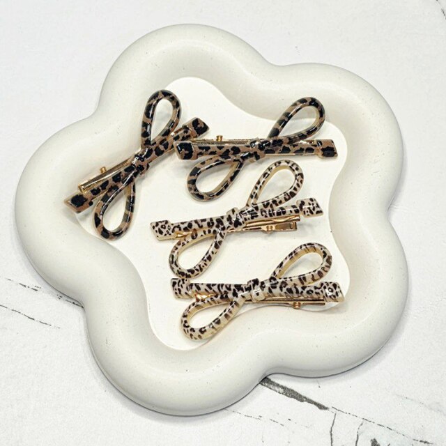 گیره انبری کارتی پاپیون رزینی پلنگی (02020063)